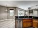 Kitchen with island, stainless steel appliances, and wood cabinets at 8303 Deerbrook Cir, Sarasota, FL 34238