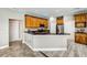 Modern kitchen with island and stainless steel appliances at 8303 Deerbrook Cir, Sarasota, FL 34238