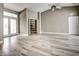 Living room with tile floors and access to a sunroom at 8303 Deerbrook Cir, Sarasota, FL 34238