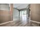 Spacious living room with tile floors and sliding glass doors at 8303 Deerbrook Cir, Sarasota, FL 34238