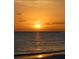 Stunning sunset over the ocean horizon at 8303 Deerbrook Cir, Sarasota, FL 34238