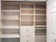 Large closet featuring multiple shelves and a hanging rod at 96 Tall Trees Ct, Sarasota, FL 34232