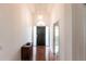 Bright entryway with hardwood floors and dark door at 96 Tall Trees Ct, Sarasota, FL 34232