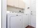 Convenient laundry room with Maytag washer and dryer at 96 Tall Trees Ct, Sarasota, FL 34232