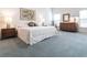 Spacious primary bedroom with plush carpeting and ample natural light at 96 Tall Trees Ct, Sarasota, FL 34232