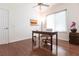 Home office with hardwood floors, desk, and ample natural light at 96 Tall Trees Ct, Sarasota, FL 34232