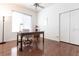 Spacious home office with hardwood floors, large window and built in shelving at 96 Tall Trees Ct, Sarasota, FL 34232