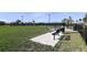 Fenced dog park with benches and waste disposal at 10160 Silent Night Ln, Sarasota, FL 34241