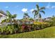 Landscaped pool area with lounge chairs at 10160 Silent Night Ln, Sarasota, FL 34241