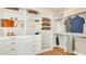 Large walk-in closet with ample shelving and hanging space at 10160 Silent Night Ln, Sarasota, FL 34241