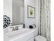 Clean bathroom with single vanity and shower/tub combo at 10224 Silent Night Ln, Sarasota, FL 34241