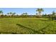 Spacious dog park with grassy area and playground nearby at 10446 Morning Mist Ln, Sarasota, FL 34241