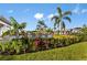 Resort-style pool with lounge chairs and lush landscaping at 10446 Morning Mist Ln, Sarasota, FL 34241