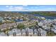 Aerial view of waterfront community with lush landscaping and boat slips at 1275 Siesta Bayside Dr # 1275, Sarasota, FL 34242