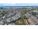 Aerial view of community near the beach, featuring water access and lush landscaping at 1275 Siesta Bayside Dr # 1275, Sarasota, FL 34242