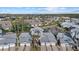 Aerial view of townhomes near a pond at 1275 Siesta Bayside Dr # 1275, Sarasota, FL 34242