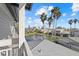Relaxing balcony view overlooking a tranquil pond and community at 1275 Siesta Bayside Dr # 1275, Sarasota, FL 34242