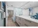 Spa-like bathroom with double vanity and walk-in shower at 1275 Siesta Bayside Dr # 1275, Sarasota, FL 34242