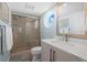 Bathroom with shower, toilet, and vanity with marble top at 1275 Siesta Bayside Dr # 1275, Sarasota, FL 34242