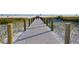 Boardwalk path leading to the beach at 1275 Siesta Bayside Dr # 1275, Sarasota, FL 34242