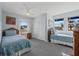 Bedroom with two twin beds and access to balcony at 1275 Siesta Bayside Dr # 1275, Sarasota, FL 34242