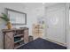 Bright and airy entryway with built-in storage at 1275 Siesta Bayside Dr # 1275, Sarasota, FL 34242