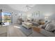 Cozy living room with two sofas, a coffee table, and a view to balcony at 1275 Siesta Bayside Dr # 1275, Sarasota, FL 34242