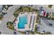 L-shaped community pool and sundeck at 1275 Siesta Bayside Dr # 1275, Sarasota, FL 34242