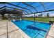 Luxury pool with spa and fire feature, screened enclosure at 1655 51St W St, Bradenton, FL 34209