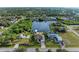 Stunning waterfront home with lush landscaping and private dock at 17413 Pheasant Cir, Port Charlotte, FL 33948