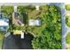 Bird's eye view of waterfront home with private dock and lush landscaping at 17413 Pheasant Cir, Port Charlotte, FL 33948