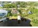Property features a canal-front home with a private dock and shed at 17413 Pheasant Cir, Port Charlotte, FL 33948