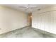 Simple bedroom with carpet flooring and a double door closet at 17413 Pheasant Cir, Port Charlotte, FL 33948