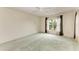 Bright bedroom with carpet flooring and large window at 17413 Pheasant Cir, Port Charlotte, FL 33948