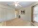 Guest bedroom with double door closet at 17413 Pheasant Cir, Port Charlotte, FL 33948