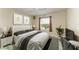 Bright bedroom with a queen-size bed and ample natural light at 17413 Pheasant Cir, Port Charlotte, FL 33948
