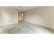 Bright bedroom with ceiling fan and carpet at 17413 Pheasant Cir, Port Charlotte, FL 33948