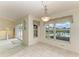 Casual dining area with water views and neutral tile floor at 17413 Pheasant Cir, Port Charlotte, FL 33948