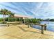 Spacious wooden deck and dock perfect for relaxing by the water at 17413 Pheasant Cir, Port Charlotte, FL 33948