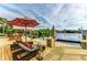 Private dock with lounge chairs and seating area at 17413 Pheasant Cir, Port Charlotte, FL 33948