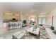 Open concept kitchen and living area with island and breakfast bar at 17413 Pheasant Cir, Port Charlotte, FL 33948
