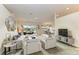 Spacious living room with water views and comfortable seating at 17413 Pheasant Cir, Port Charlotte, FL 33948