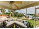 Relaxing screened lanai overlooking the canal and dock at 17413 Pheasant Cir, Port Charlotte, FL 33948