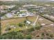 Aerial view showing home, land, and outbuildings at 19990 E State Road 64, Bradenton, FL 34212