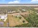 Aerial view of property with home and large lot at 19990 E State Road 64, Bradenton, FL 34212