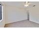 Large bedroom with ceiling fan and carpet flooring at 20096 Tappan Zee Dr, Port Charlotte, FL 33952