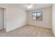Bright bedroom with carpet flooring and a window at 20096 Tappan Zee Dr, Port Charlotte, FL 33952