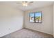 Spacious bedroom featuring carpet and a large window at 20096 Tappan Zee Dr, Port Charlotte, FL 33952