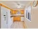 Cozy kitchen with wood cabinets and tile floors at 20096 Tappan Zee Dr, Port Charlotte, FL 33952