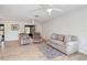 Living room with tiled floors and comfy seating at 20096 Tappan Zee Dr, Port Charlotte, FL 33952